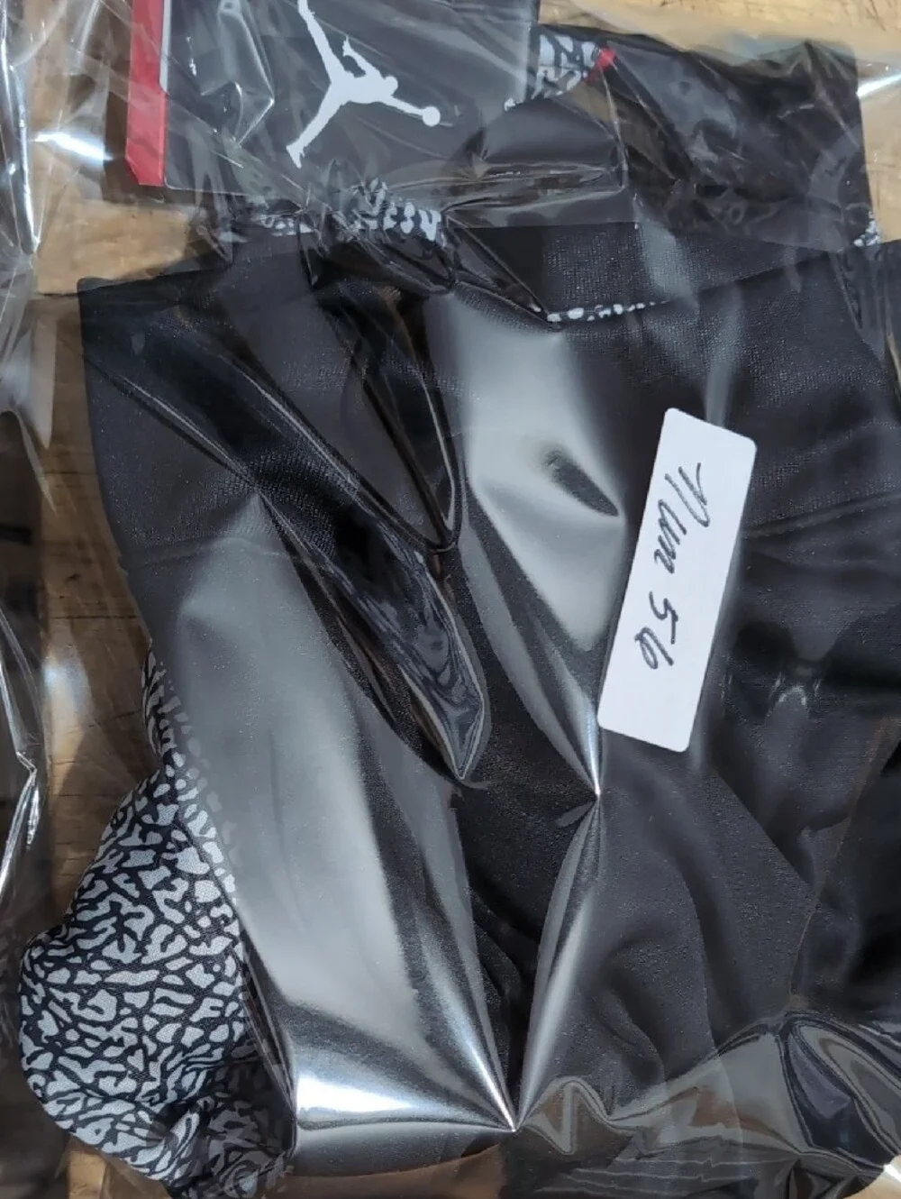 Jordan Black Hoodie with Pink/Red Jumpman and Gray Patterned Sleeves